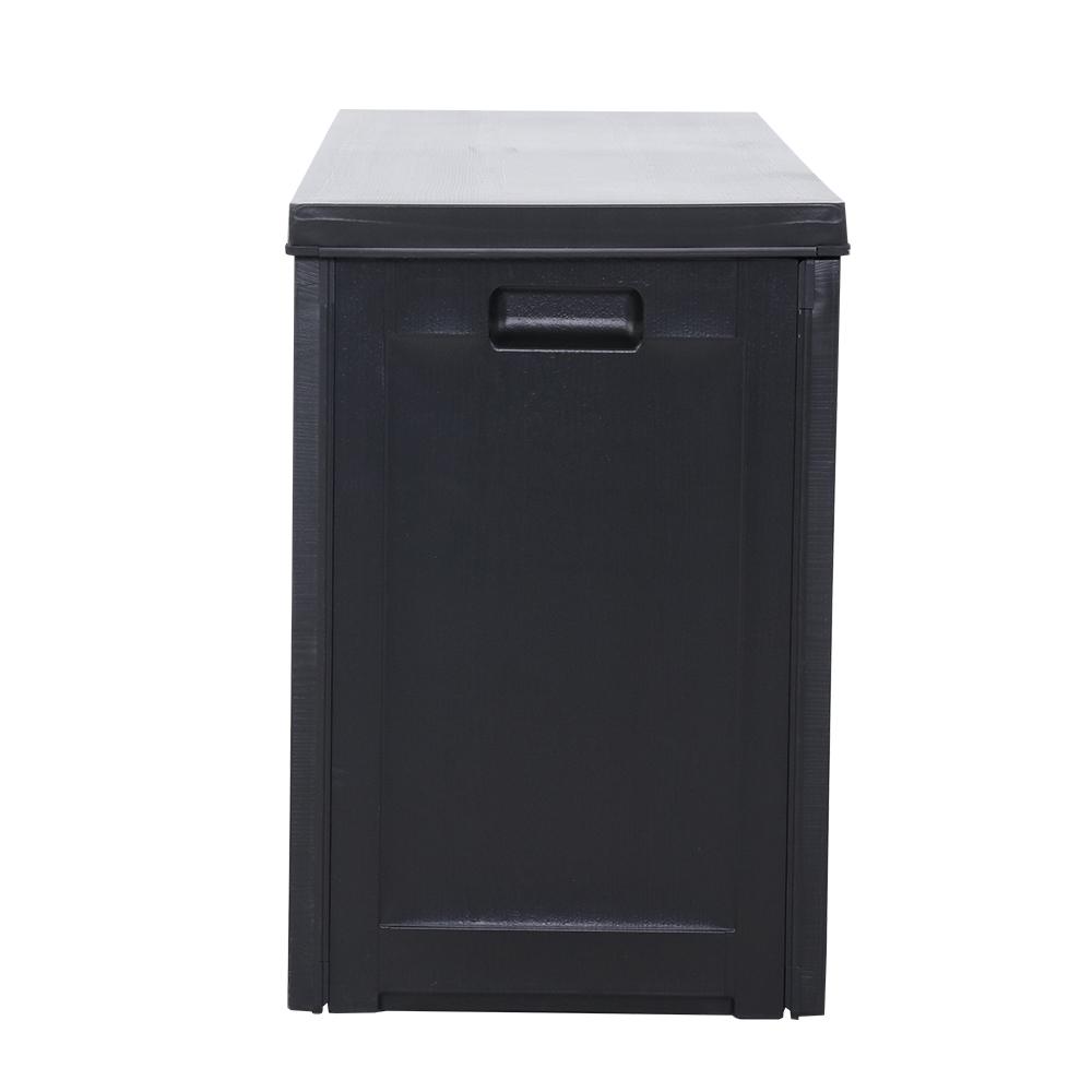 Gardeon 240L Outdoor Storage Box in black, featuring a lockable lid and aluminum hinge, used as a bench seat in a garden setting.