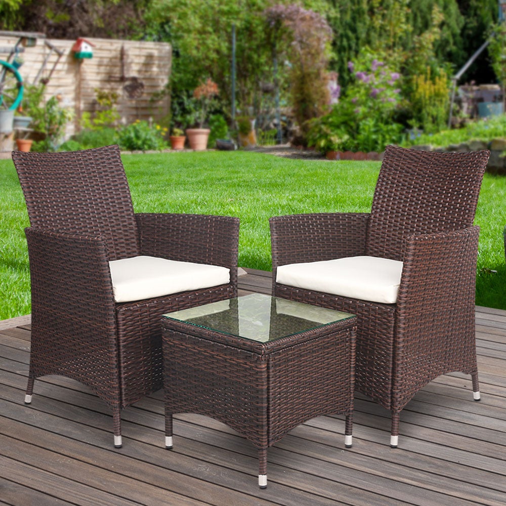 Gardeon 3 Piece Wicker Outdoor Furniture Set in Brown featuring two sofas and a glass top side table, perfect for outdoor relaxation.