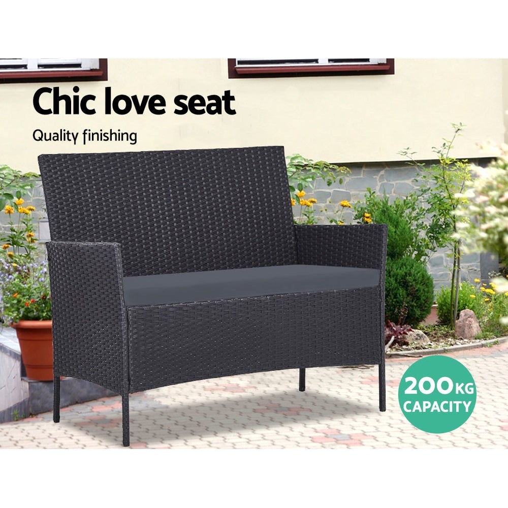 Gardeon 4-piece Wicker Outdoor Set in Black featuring a loveseat, two armchairs, and a side table with grey cushions.