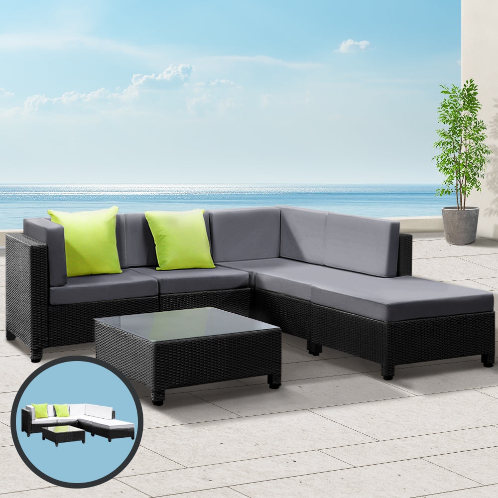 Gardeon 6pcs Outdoor Sofa Lounge Setting featuring modular design with grey cushions, black frame, and a glass-top coffee table, perfect for outdoor gatherings.