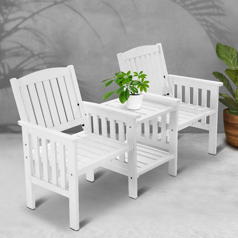 Gardeon Garden Bench Chair Table Loveseat made of natural fir wood, featuring two armchairs and an adjoining table with a parasol hole, set in a beautiful outdoor environment.