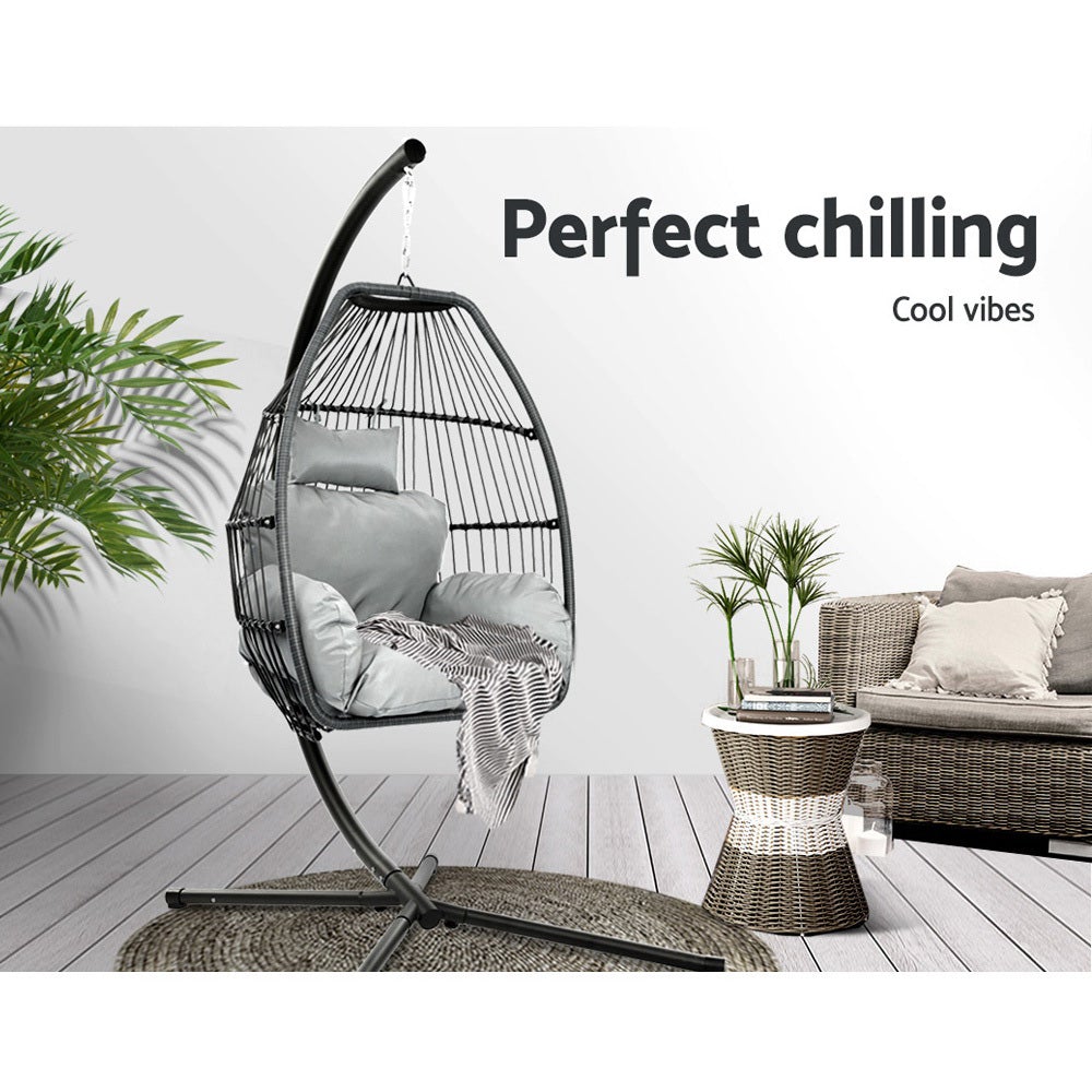 Gardeon Outdoor Furniture Egg Hammock Hanging Swing Chair with a soft cushion, showcasing its handcrafted wicker design and sturdy steel frame.
