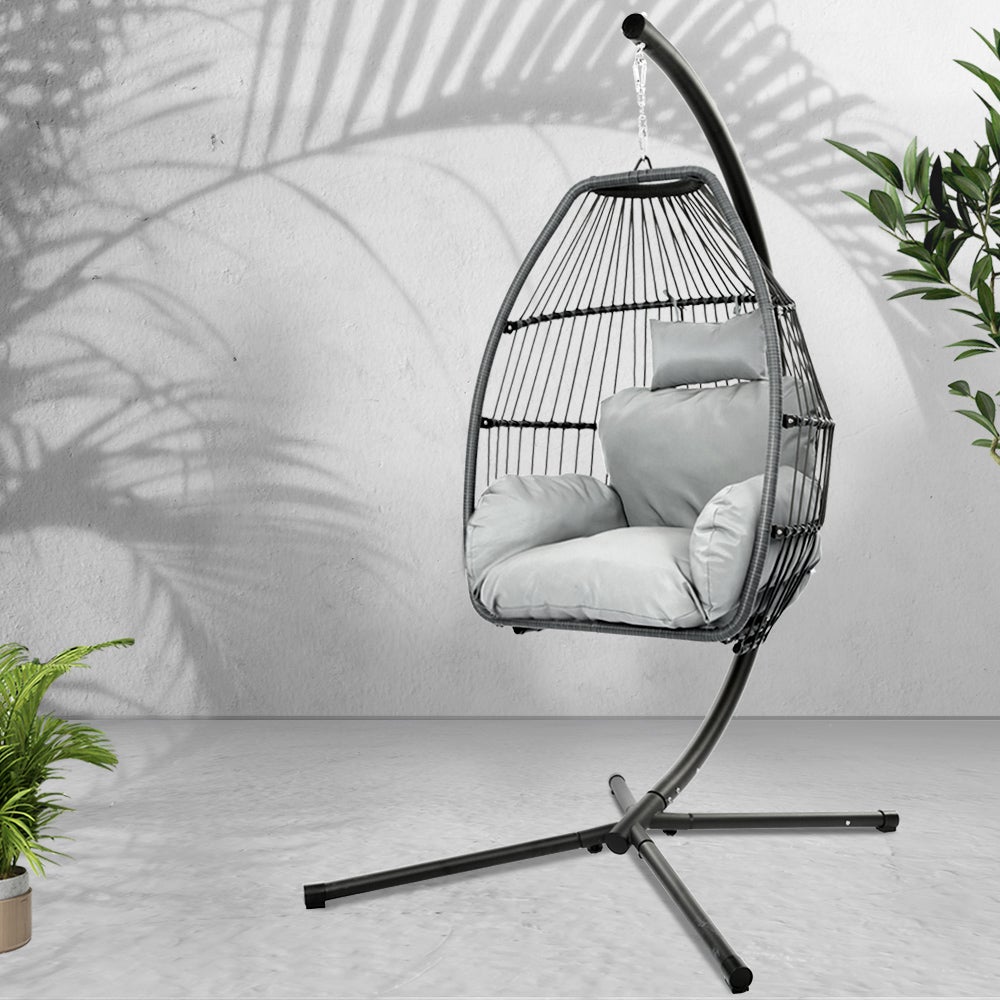 Gardeon Outdoor Furniture Egg Hammock Hanging Swing Chair with a soft cushion, showcasing its handcrafted wicker design and sturdy steel frame.