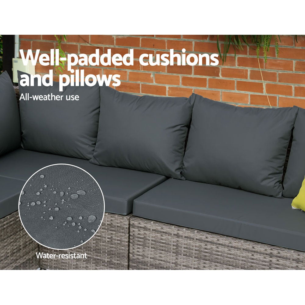 Gardeon Outdoor Furniture Patio Set featuring a stylish sofa, table, and lounge chairs in a garden setting, showcasing its modern design and comfort.