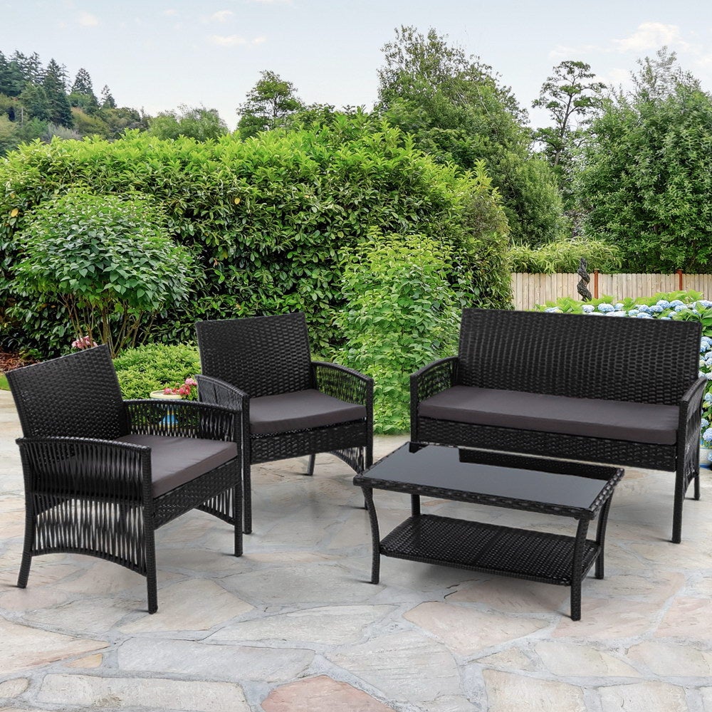 Gardeon Outdoor Furniture Set featuring black wicker and soft cushions, including a double seat chair, two single armchairs, and a coffee table.