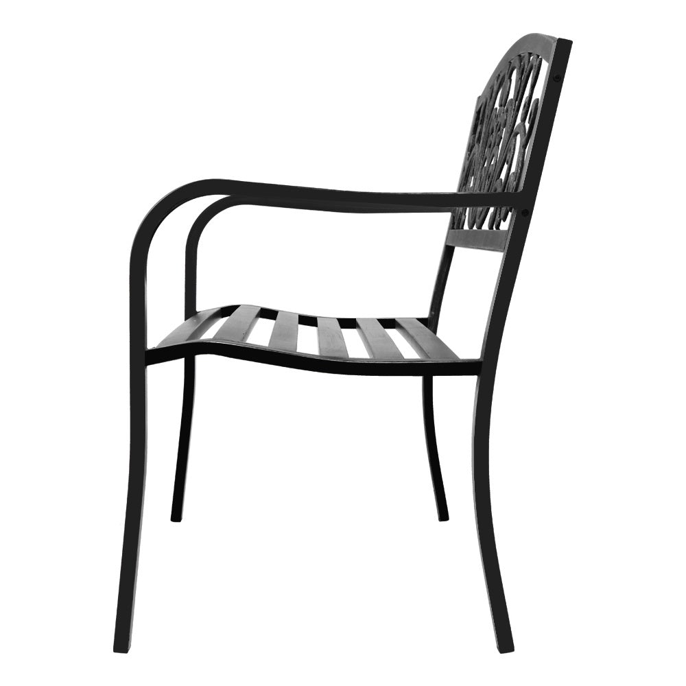 Gardeon Outdoor Garden Bench in Black with Victorian-inspired design and floral-patterned backrest, set in a garden.