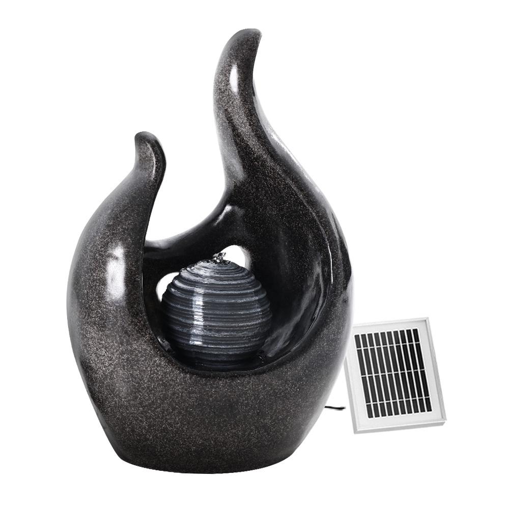 Gardeon Solar Water Fountain featuring a 3-tier design with cascading water and a pearl, set in a garden environment.