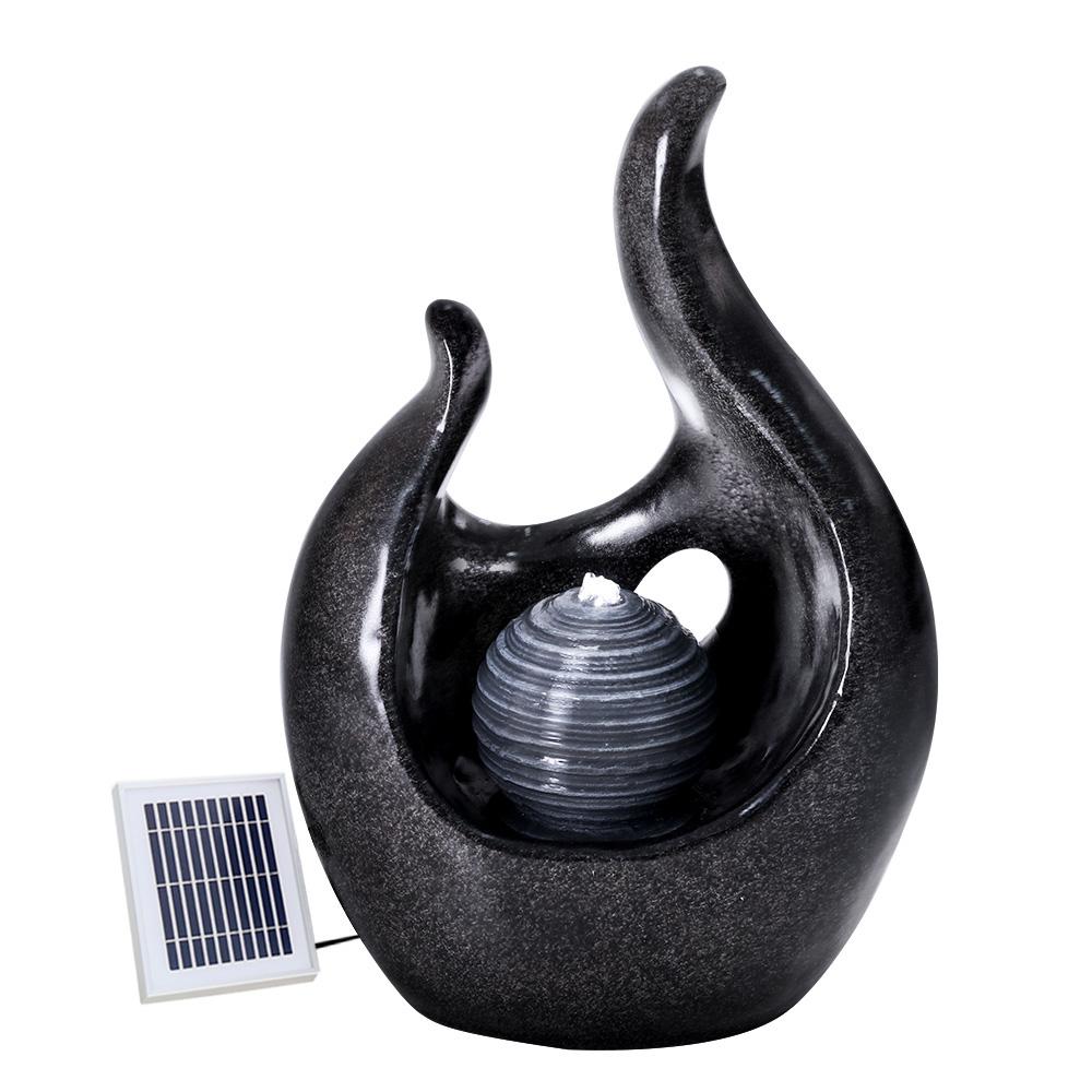 Gardeon Solar Water Fountain featuring a 3-tier design with cascading water and a pearl, set in a garden environment.