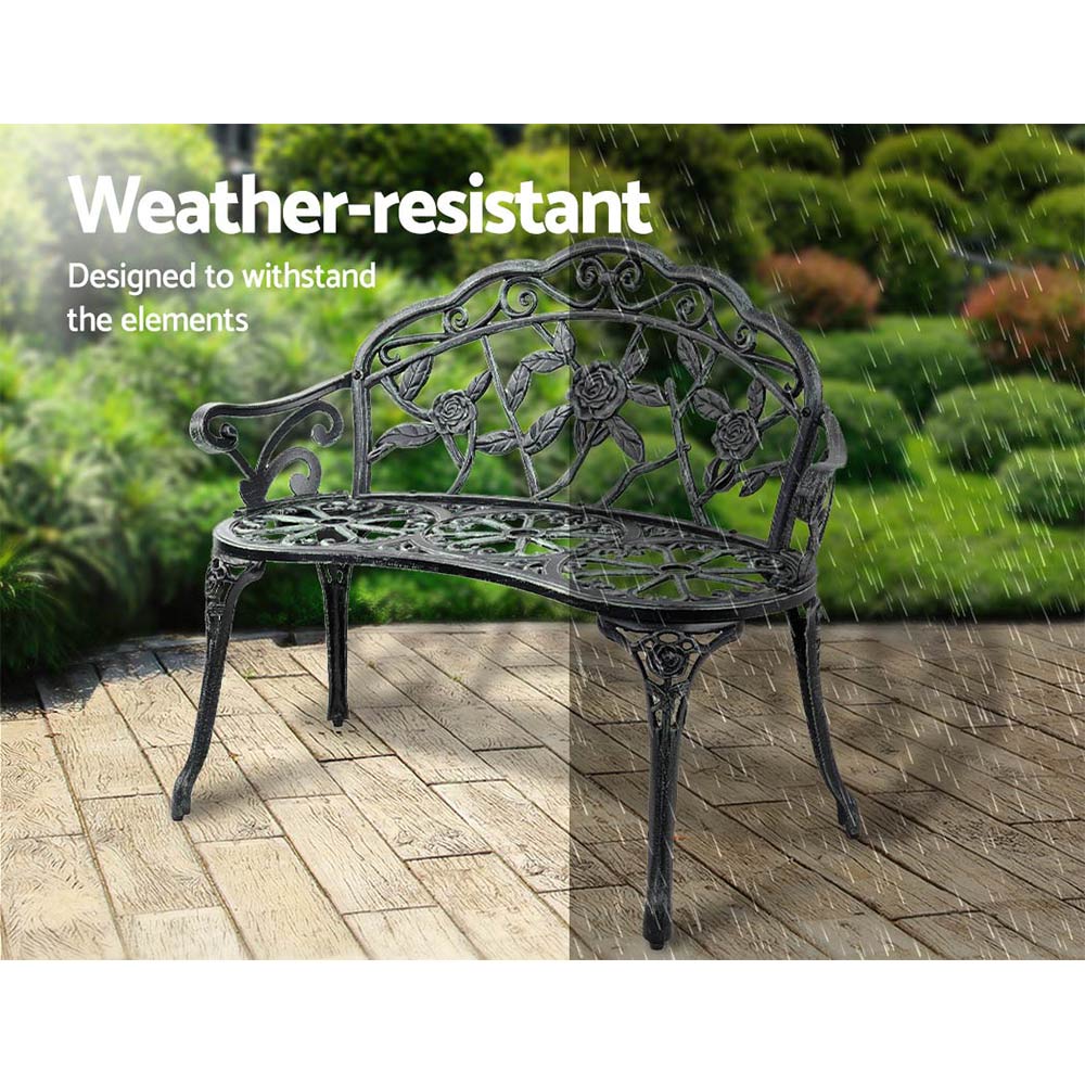Gardeon Victorian Garden Bench in green with ornate floral design and sturdy cast iron legs, perfect for outdoor seating.