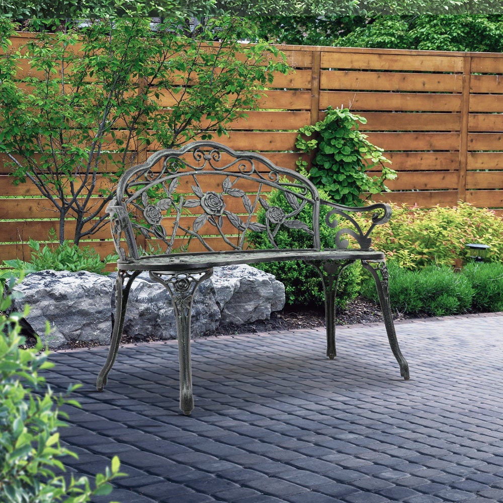 Gardeon Victorian Garden Bench in green with ornate floral design and sturdy cast iron legs, perfect for outdoor seating.