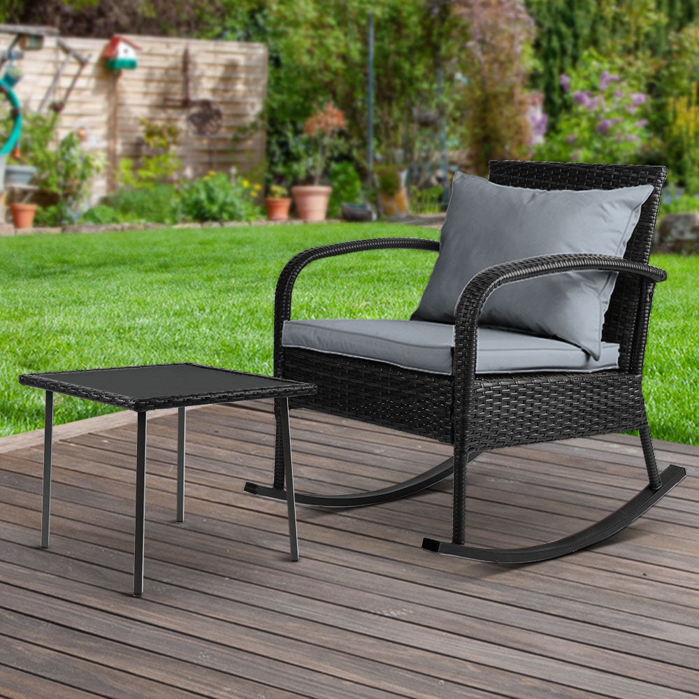 Gardeon Wicker Rocking Chairs Table Set featuring two rocking chairs with cushions and a tempered glass side table, perfect for outdoor relaxation.
