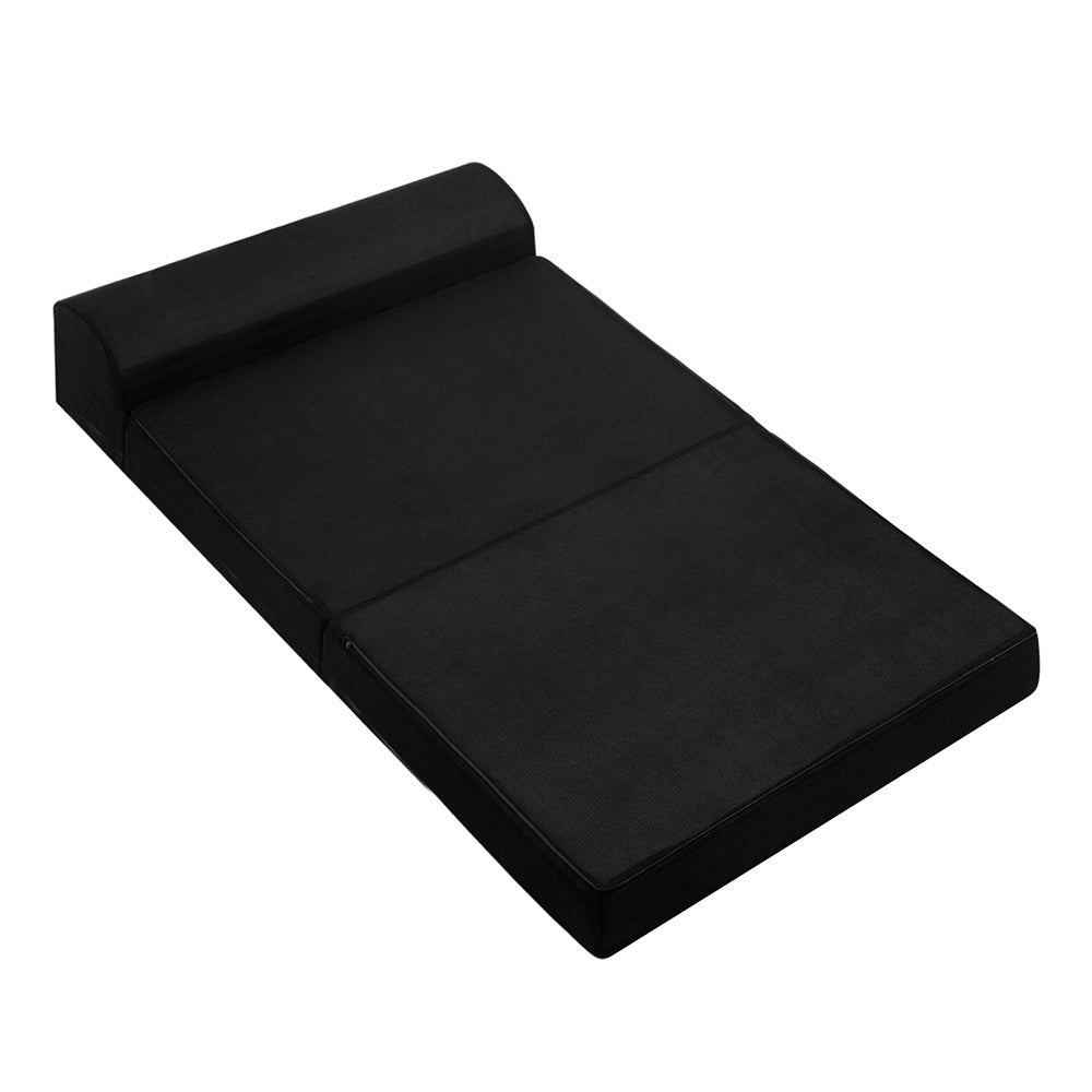 Giselle Bedding Folding Foam Mattress in black, showcasing its dual functionality as a sofa and bed, perfect for small spaces.