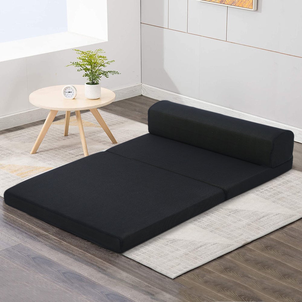 Giselle Bedding Folding Foam Mattress in black, showcasing its dual functionality as a sofa and bed, perfect for small spaces.