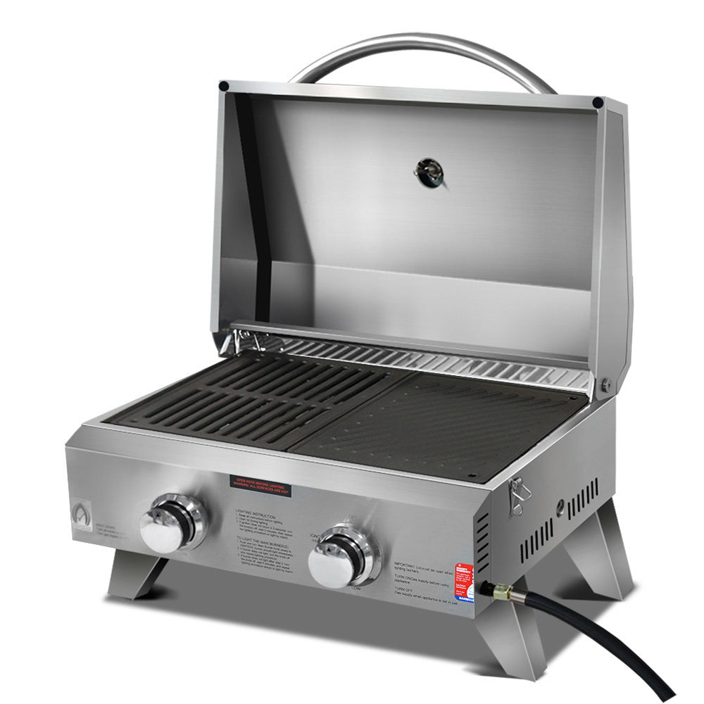 Grillz Portable Gas BBQ with two burners, stainless steel construction, and foldable design, perfect for outdoor cooking.