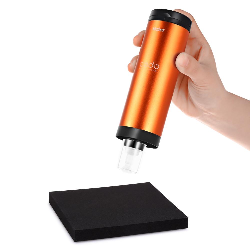 Haier MXG1C Codo Mini Washing Machine in a compact design, showcasing its portable features and squeeze-wash technology.