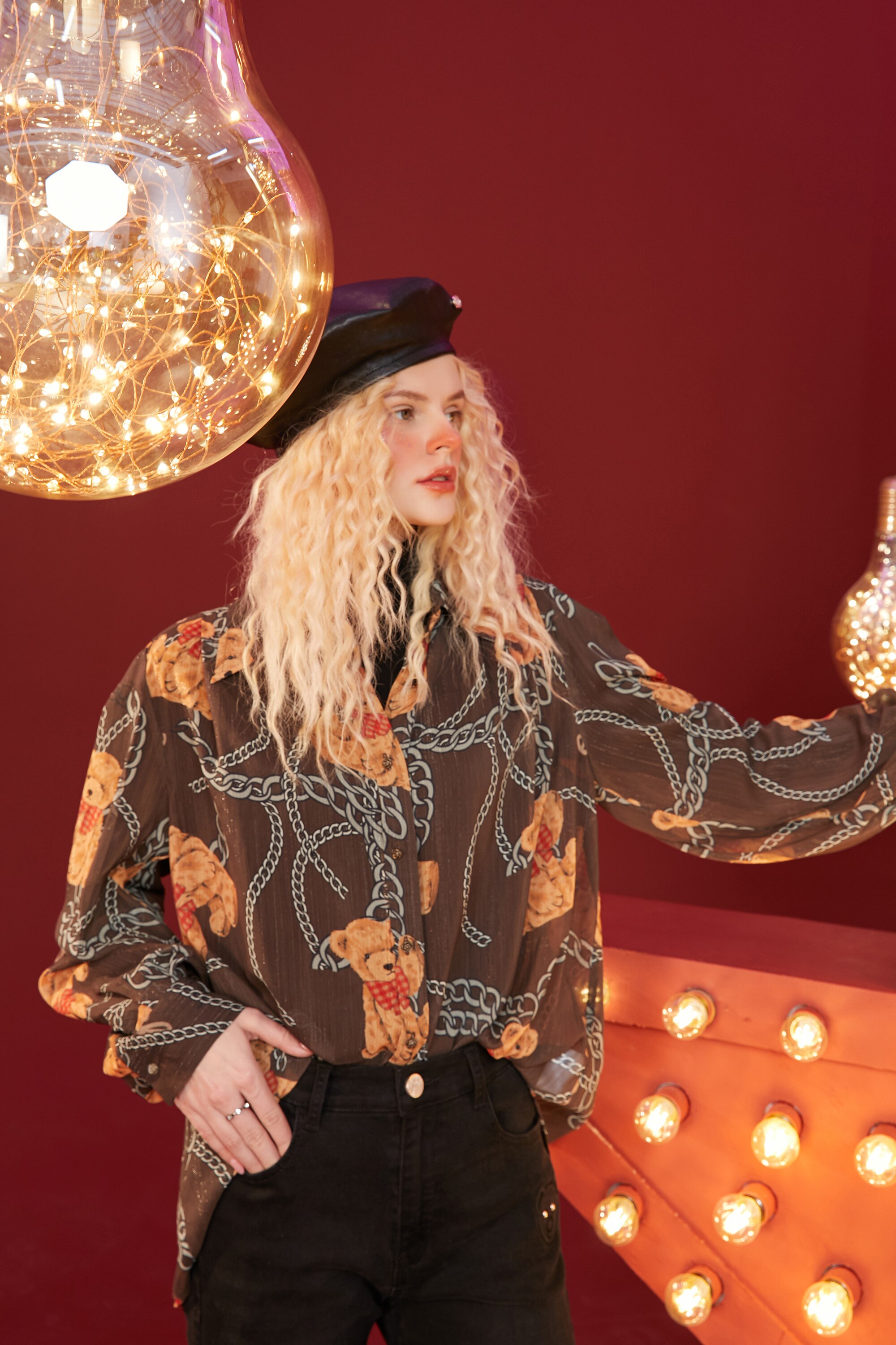 A stylish women's casual shirt featuring a cute bear print, perfect for winter wear, made from soft cotton fabric.