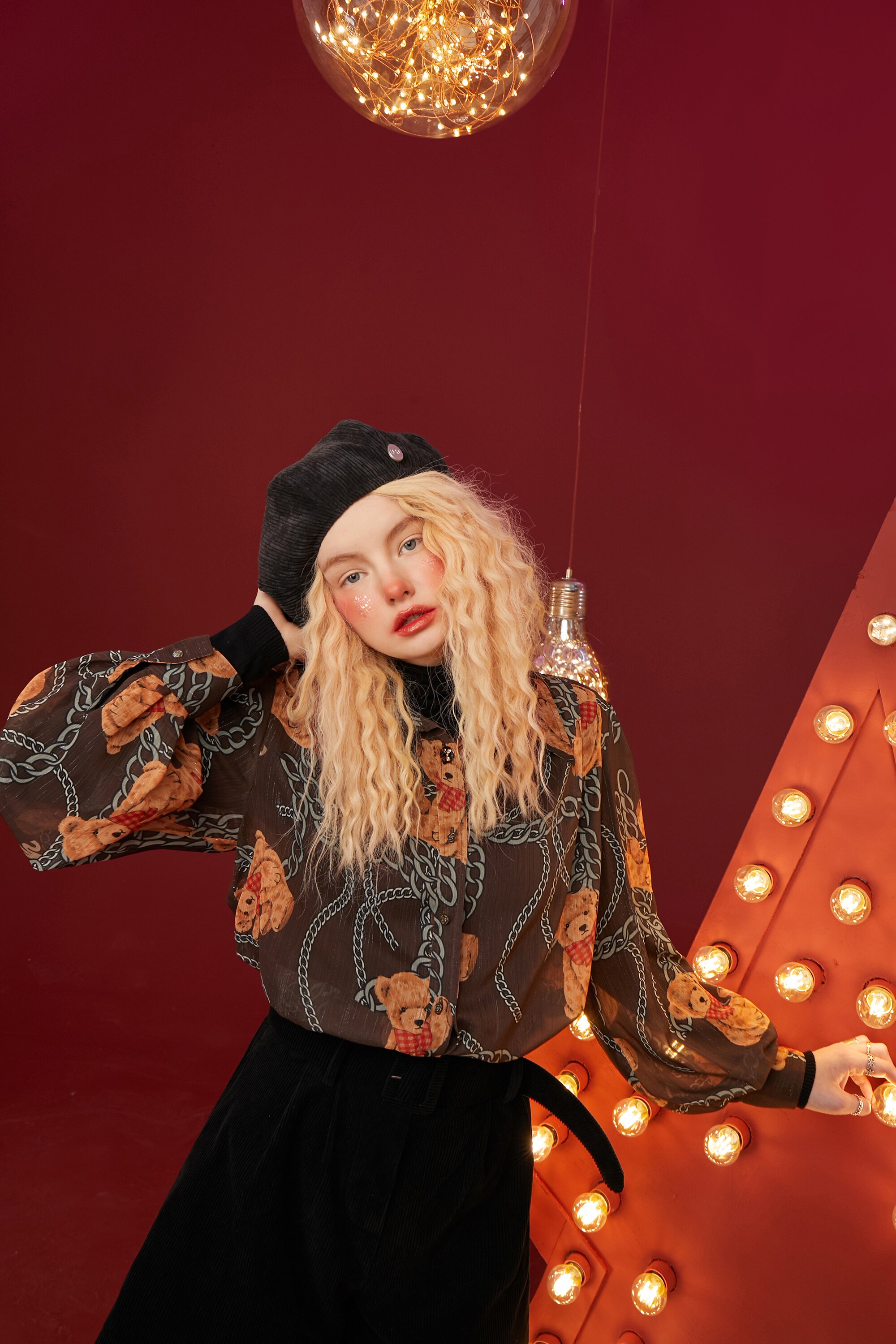 A stylish women's casual shirt featuring a cute bear print, perfect for winter wear, made from soft cotton fabric.