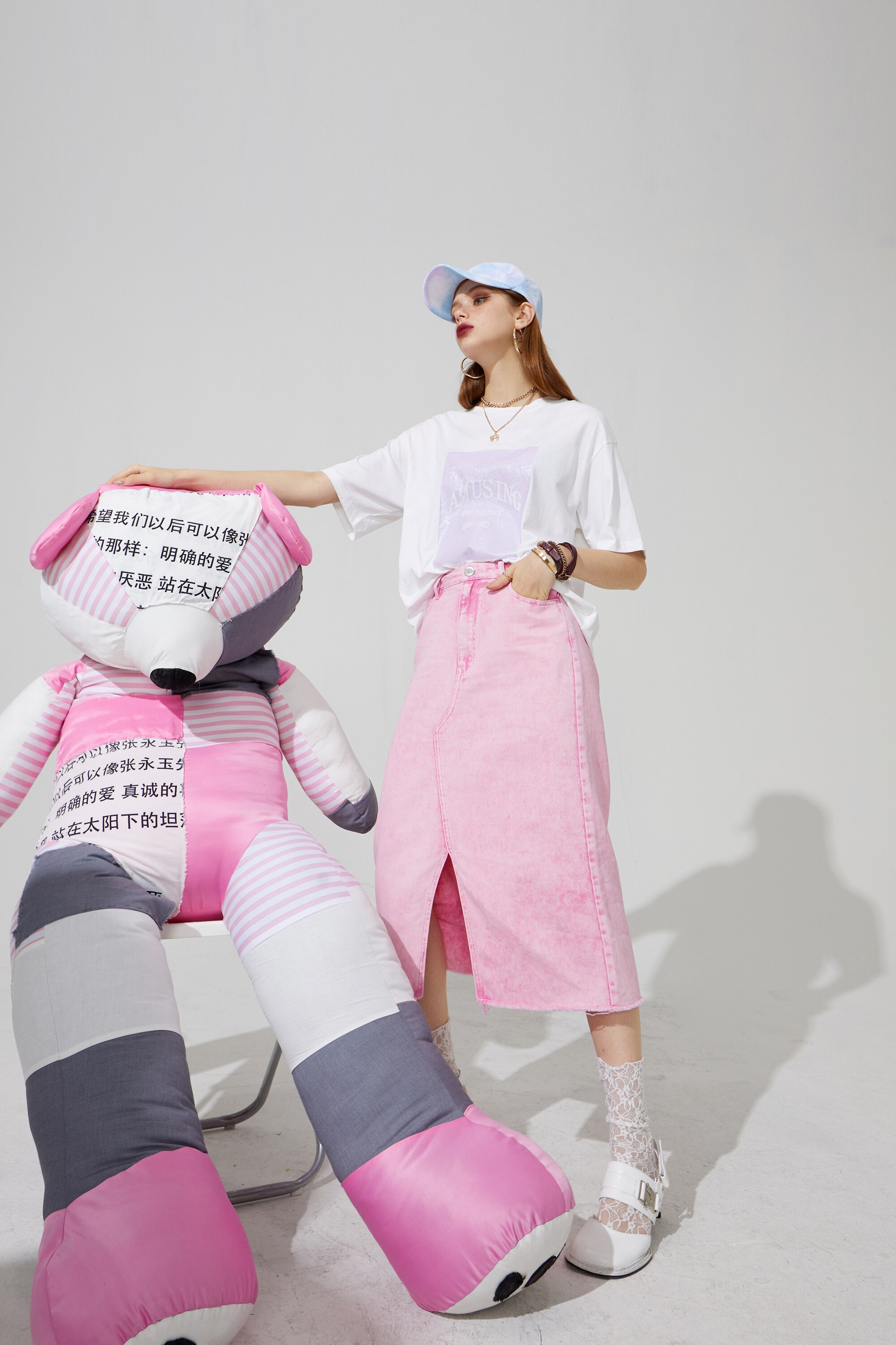 Harajuku Letter Painted Casual Oversized T-Shirt for Women, featuring a stylish letter design in a comfortable cotton fabric.
