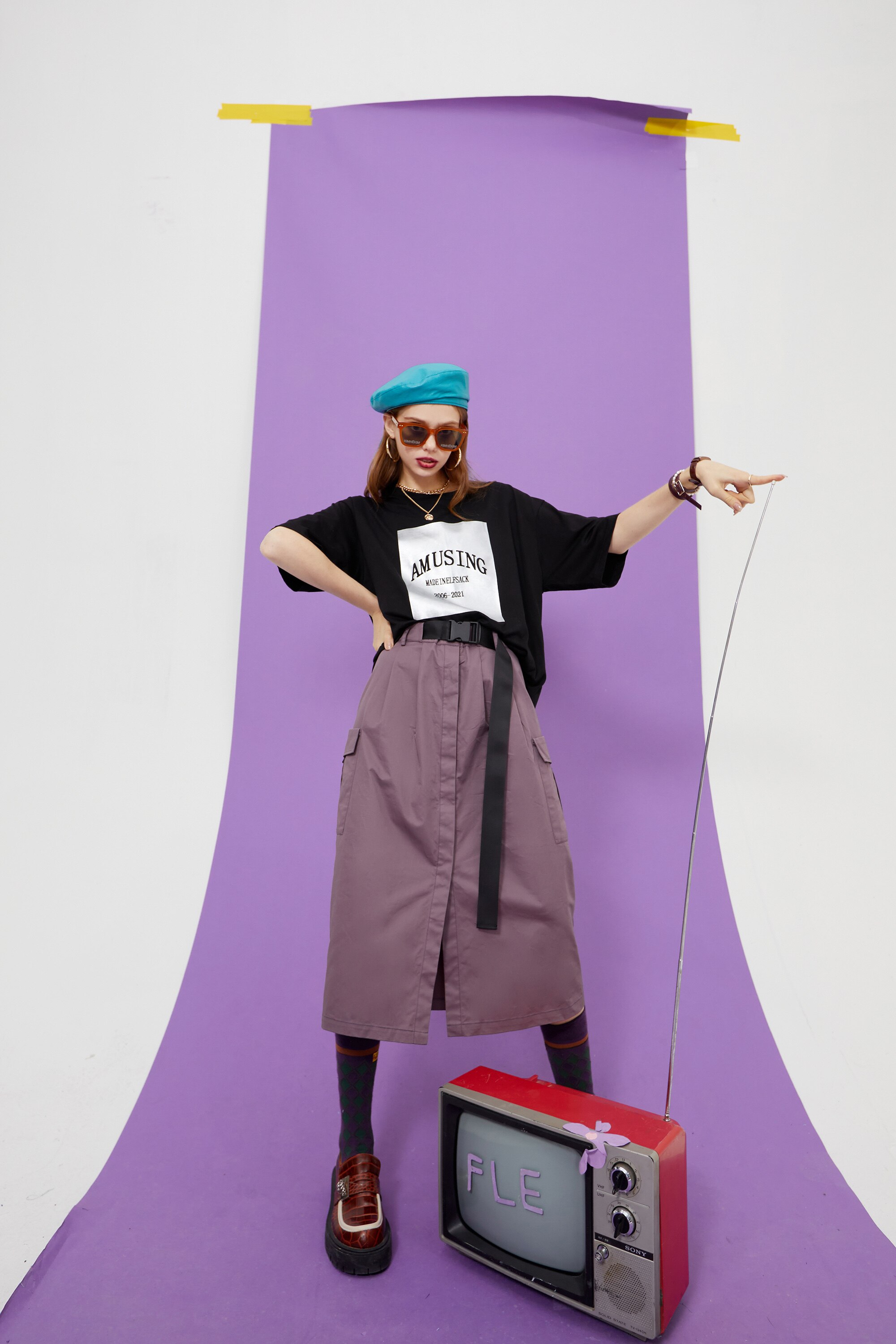 Harajuku Letter Painted Casual Oversized T-Shirt for Women, featuring a stylish letter design in a comfortable cotton fabric.