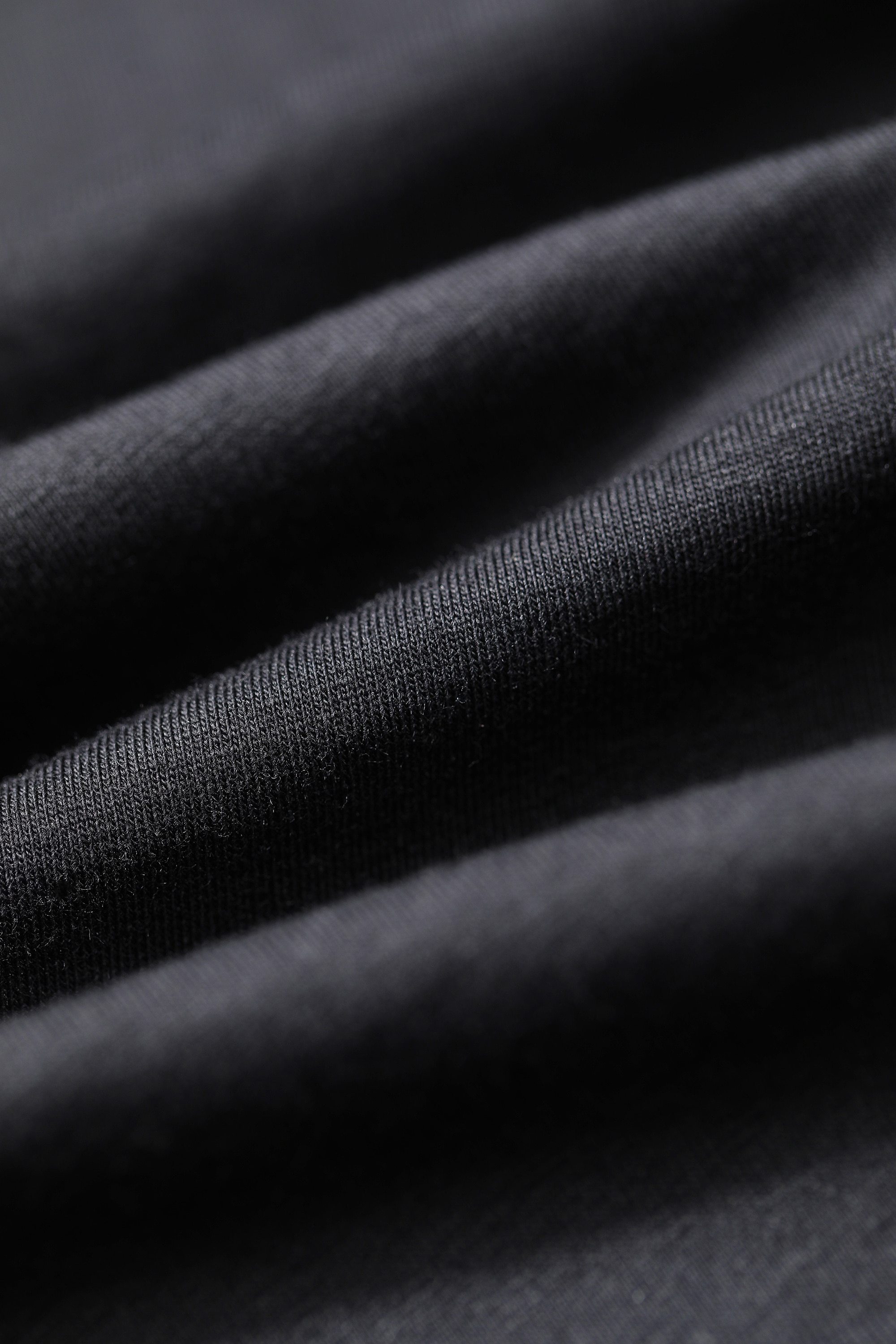 Harajuku Letter Painted Casual Oversized T-Shirt for Women, featuring a stylish letter design in a comfortable cotton fabric.