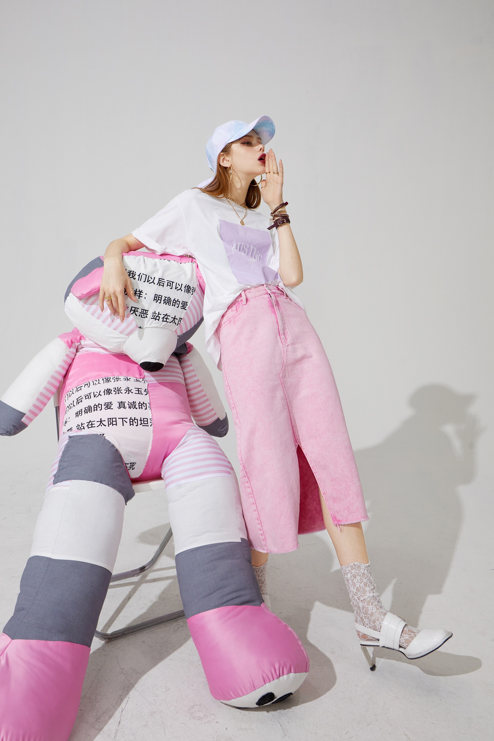 Harajuku Letter Painted Casual Oversized T-Shirt for Women, featuring a stylish letter design in a comfortable cotton fabric.