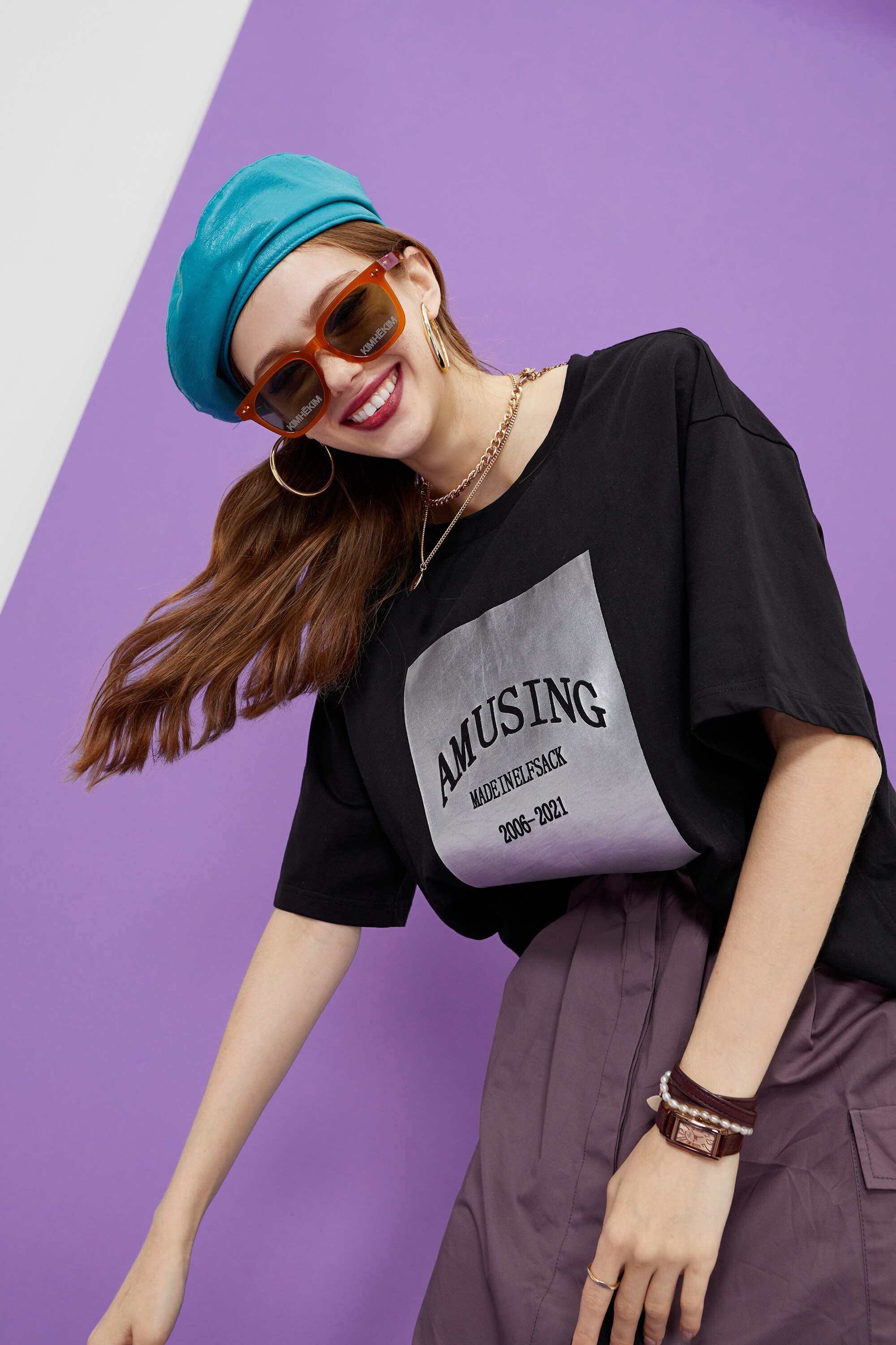 Harajuku Letter Painted Casual Oversized T-Shirt for Women, featuring a stylish letter design in a comfortable cotton fabric.