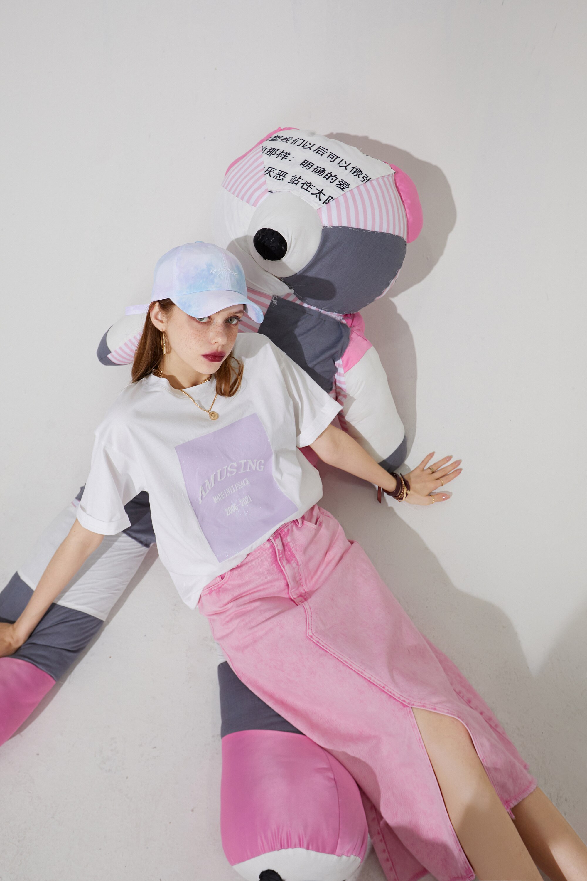 Harajuku Letter Painted Casual Oversized T-Shirt for Women, featuring a stylish letter design in a comfortable cotton fabric.