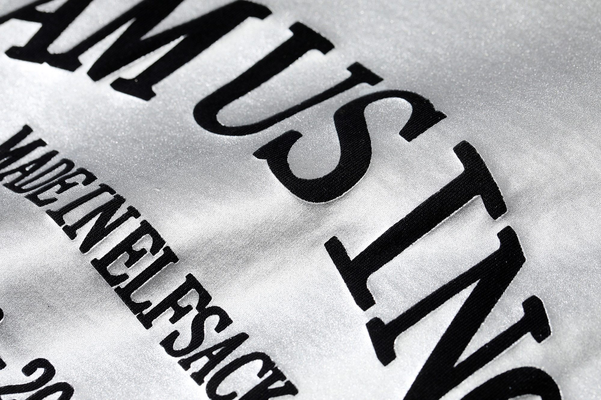 Harajuku Letter Painted Casual Oversized T-Shirt for Women, featuring a stylish letter design in a comfortable cotton fabric.