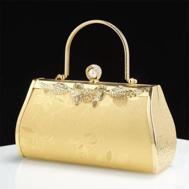 Heart Diamonds women's handbag featuring a golden chain shoulder strap and geometric pattern, perfect for parties and weddings.