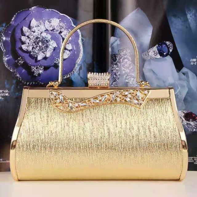 Heart Diamonds women's handbag featuring a golden chain shoulder strap and geometric pattern, perfect for parties and weddings.