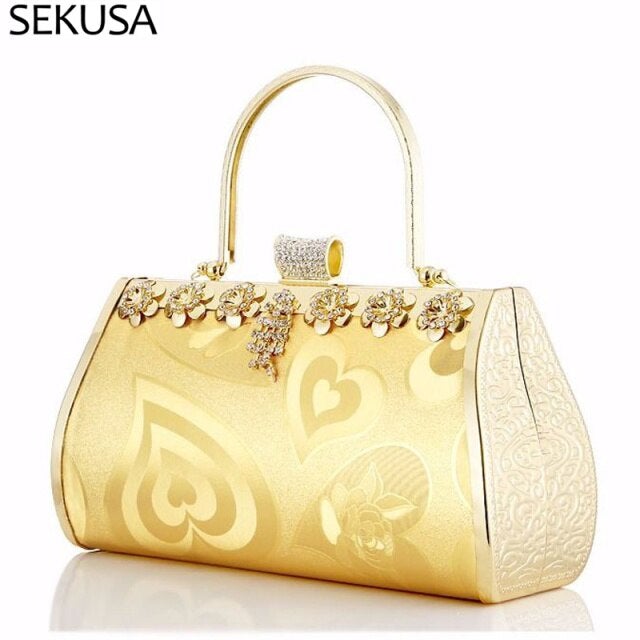 Heart Diamonds women's handbag featuring a golden chain shoulder strap and geometric pattern, perfect for parties and weddings.