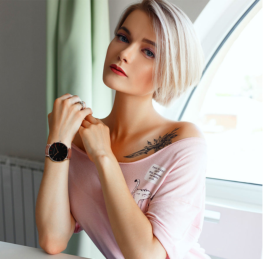 High Quality Japan Quartz Movement Women's Watch in rose gold and black leather, featuring a round case and elegant design.