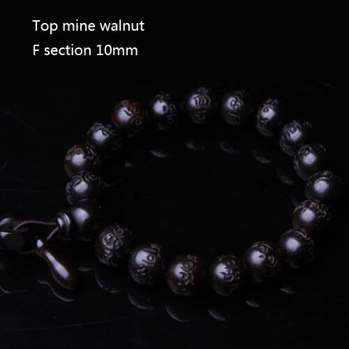 High quality Natural Lightning Peach Wood Buddha beads, hand carved, showcasing intricate details and a warm wood finish.