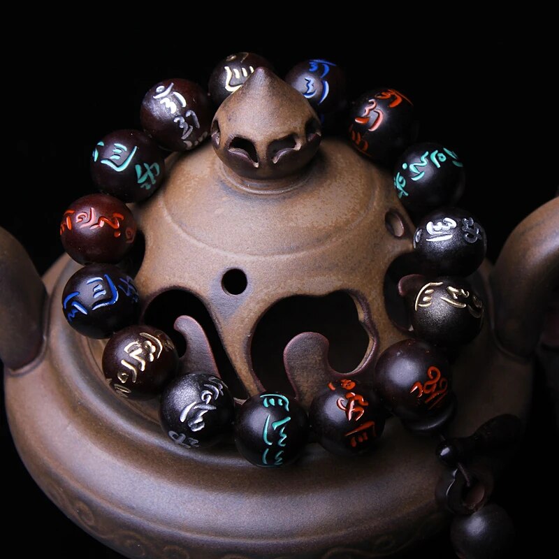 High quality Natural Lightning Peach Wood Buddha beads, hand carved, showcasing intricate details and a warm wood finish.