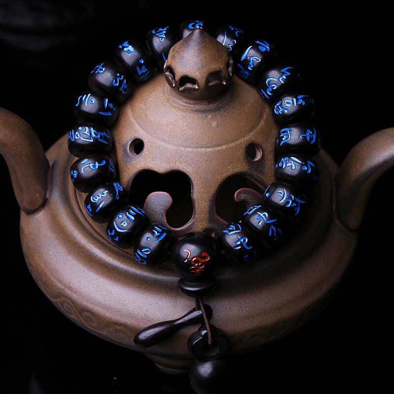 High quality Natural Lightning Peach Wood Buddha beads, hand carved, showcasing intricate details and a warm wood finish.