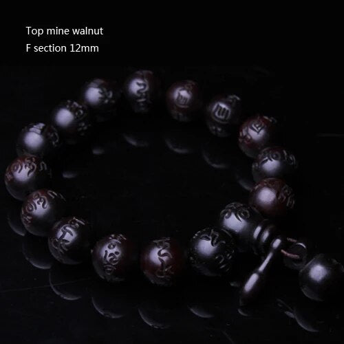 High quality Natural Lightning Peach Wood Buddha beads, hand carved, showcasing intricate details and a warm wood finish.