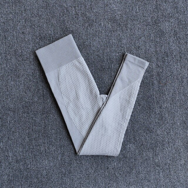 High Waist Leggings and Sport Bra Yoga Set for Women in vibrant colors, showcasing seamless design and breathable material.