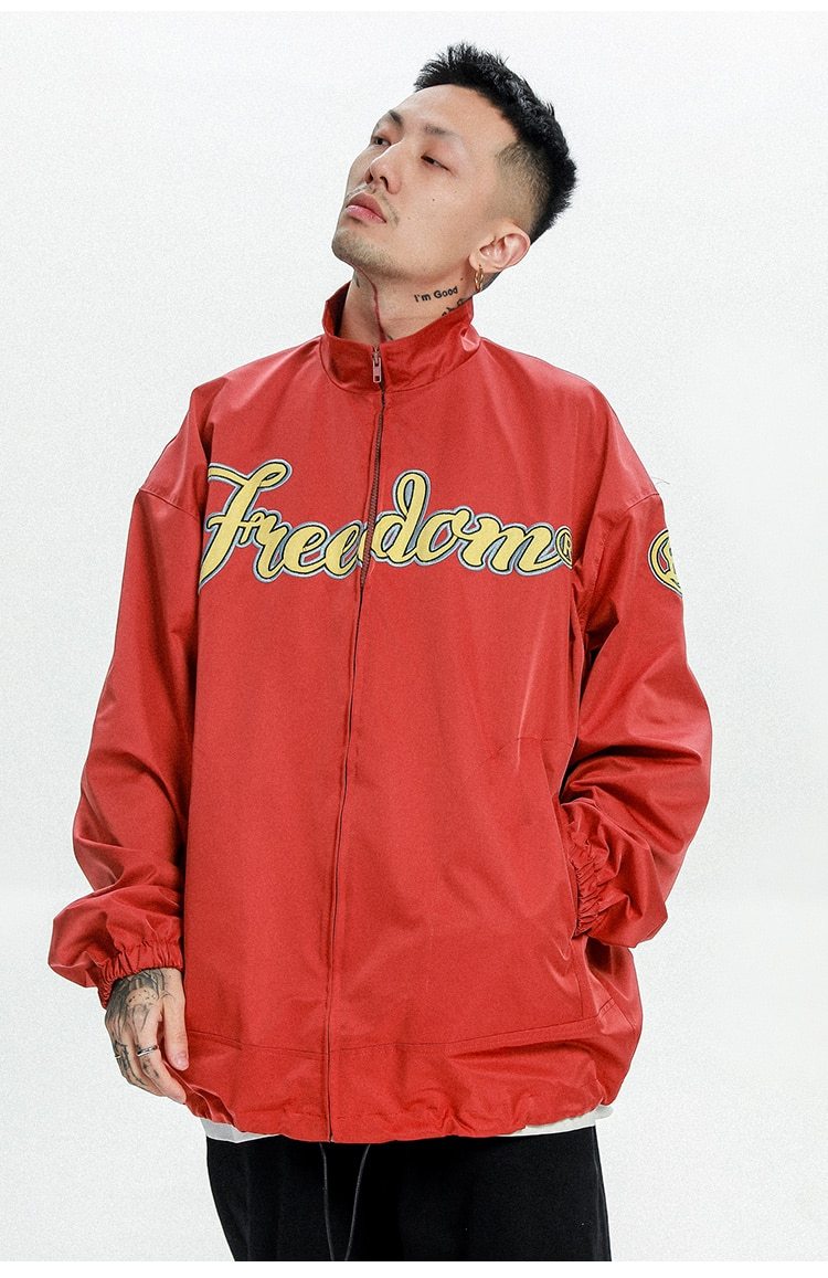 Hit Color Embroidery Turn-down Collar Jacket for men, featuring a stylish design in black, orange, and navy colors, perfect for college and streetwear.