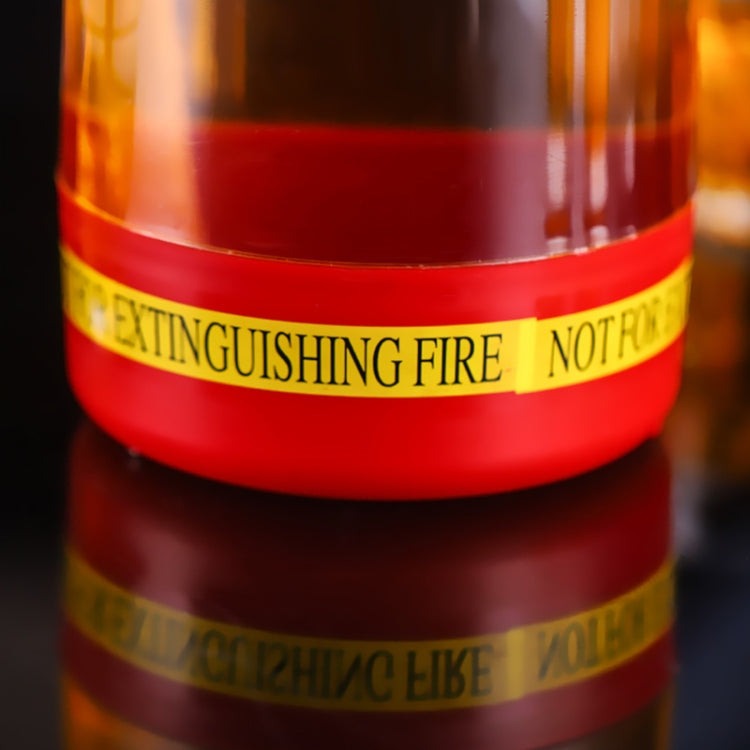 Transparent wine dispenser shaped like a fire extinguisher, showcasing its unique design and functionality.