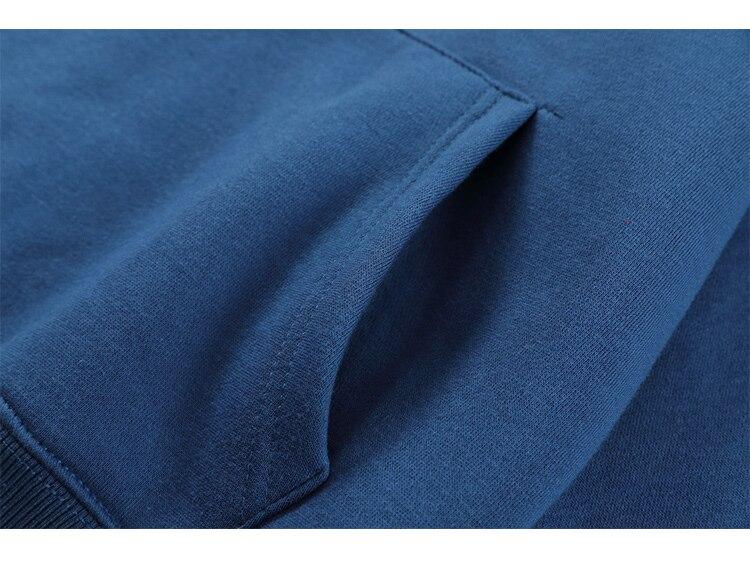 Cozy blue hoodie for men featuring a big pocket and Blue Planet letter design, perfect for autumn and winter streetwear.