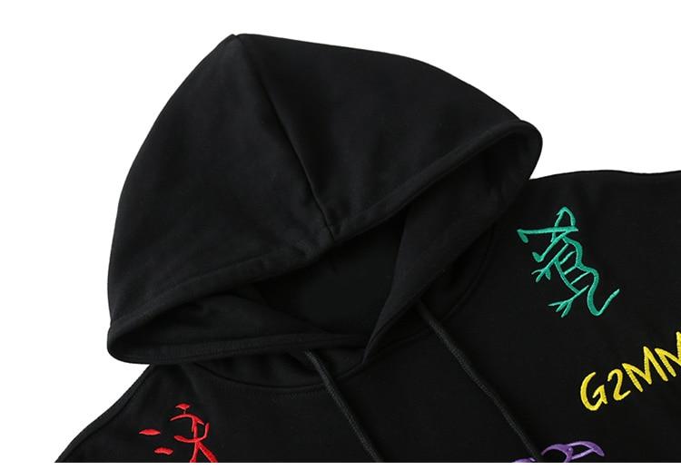 Men's hoodie featuring colorful animal embroidery in a casual style, perfect for autumn and winter wear.