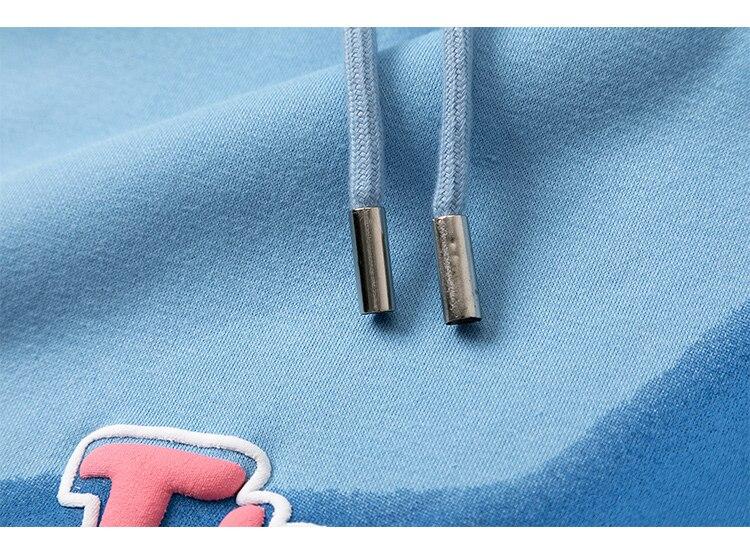 Men's colorful letter star-shaped fleece pullover hoodie in black, white, and blue, showcasing a casual college style.