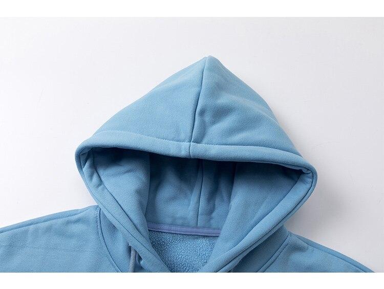Men's colorful letter star-shaped fleece pullover hoodie in black, white, and blue, showcasing a casual college style.
