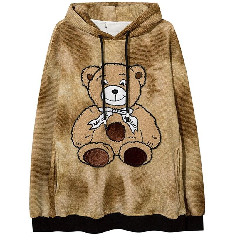Oversized fleece hoodie for men featuring a cute furry bear patch, perfect for casual streetwear in gray and brown colors.