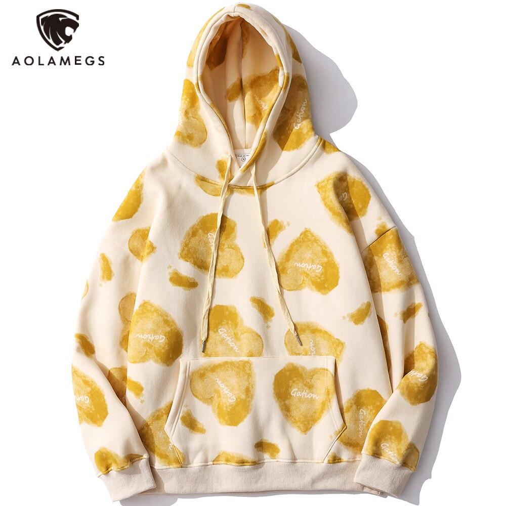 Men's hoodie featuring a heart inkjet print, big pocket, and soft velvet fabric in blue, pink, and yellow colors.