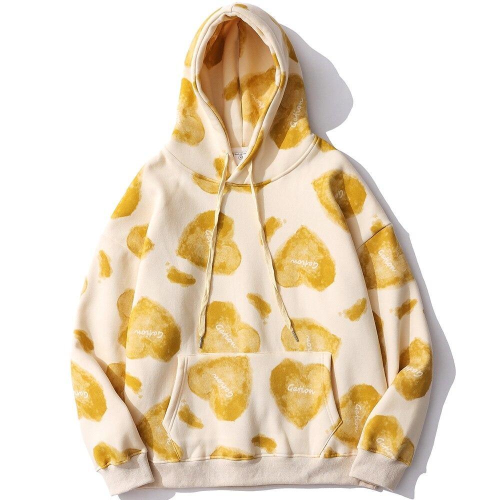 Men's hoodie featuring a heart inkjet print, big pocket, and soft velvet fabric in blue, pink, and yellow colors.