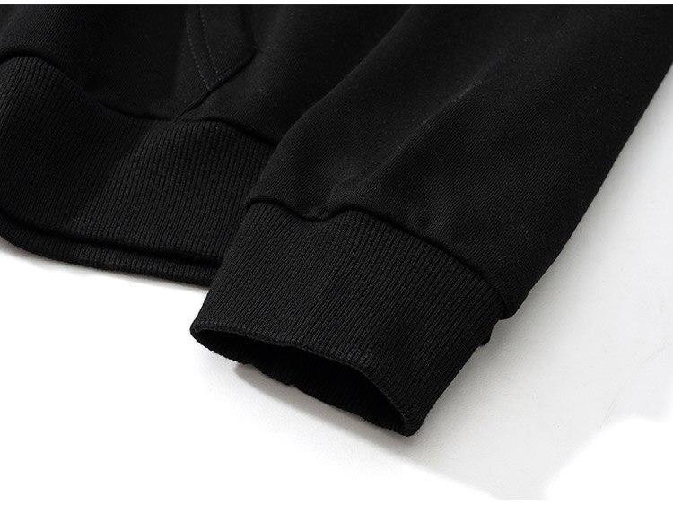 Oversized black hoodie for men featuring punk rivet details and melted letter print, perfect for autumn and winter streetwear.