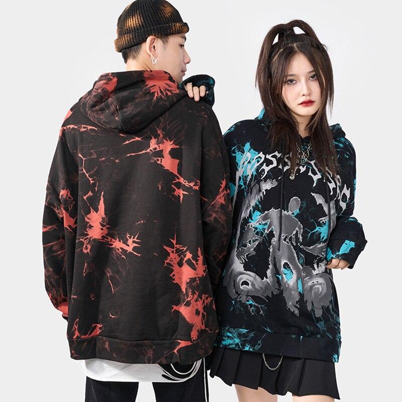 Men's oversized hoodie featuring a vibrant watercolor tie dye print in blue and red, perfect for autumn and winter streetwear.