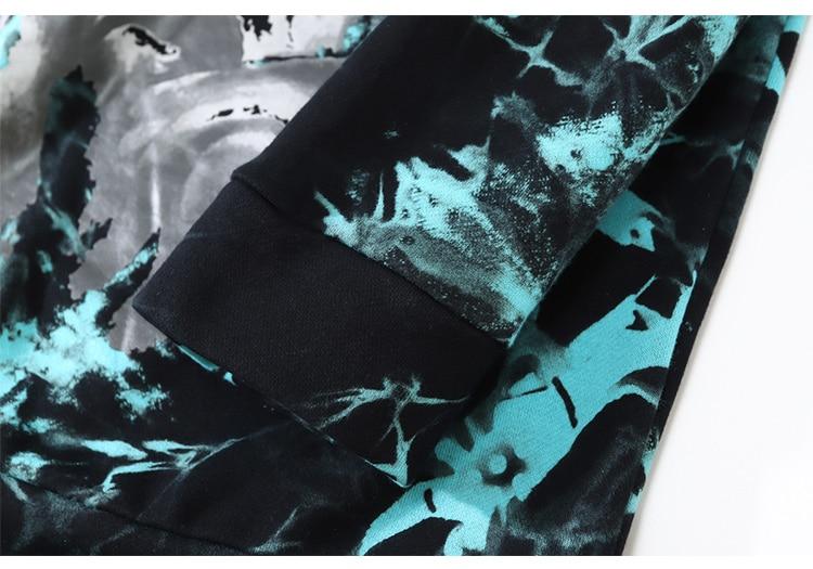 Men's oversized hoodie featuring a vibrant watercolor tie dye print in blue and red, perfect for autumn and winter streetwear.