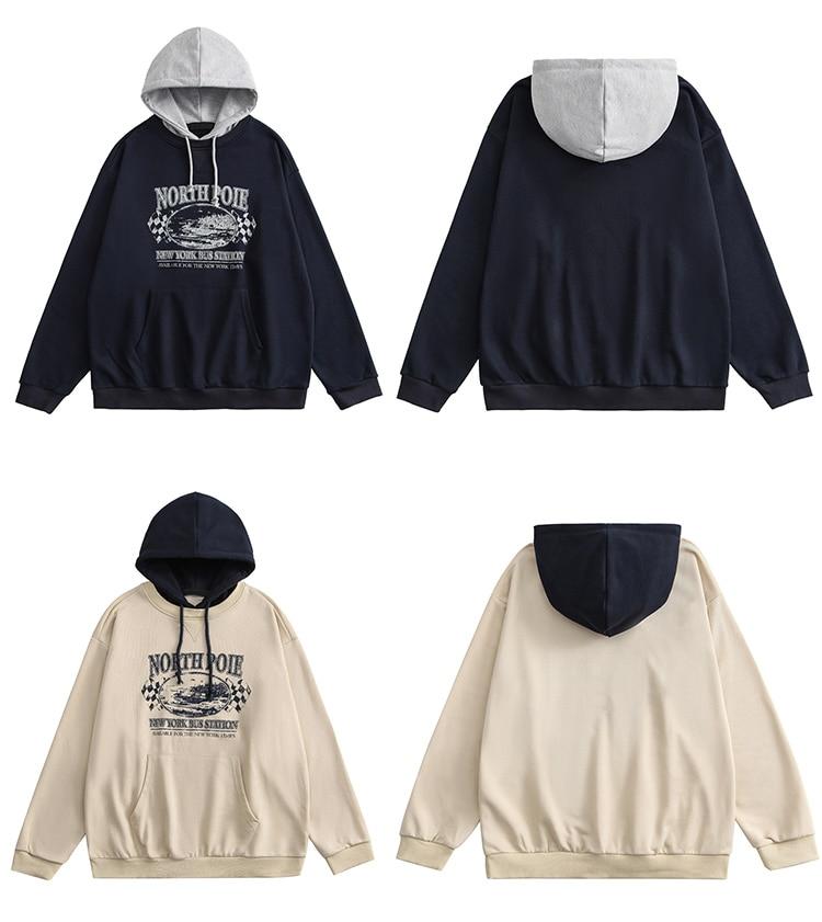 A stylish couple wearing a retro letter print patchwork color hoodie, showcasing a casual autumn streetwear look.